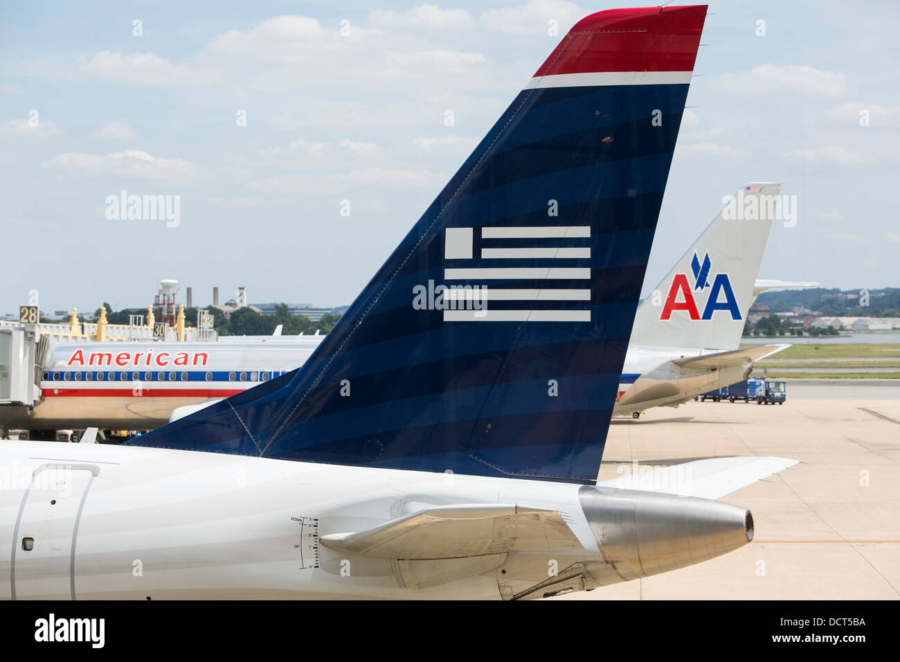 US Airways and American Airlines airplanes at Reagan National Airport.  Stock Photo