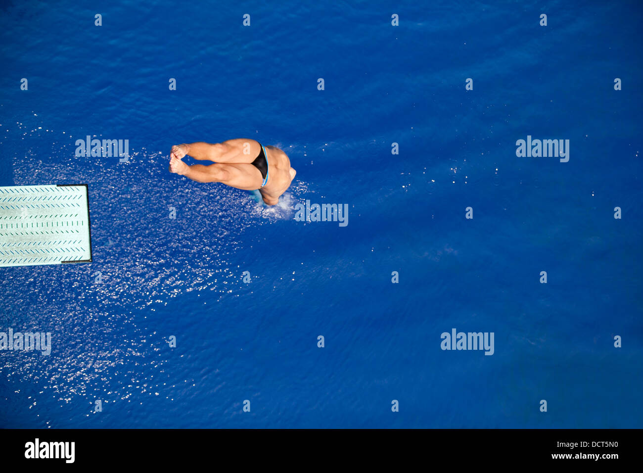 high diver jumping into the water Stock Photo Alamy