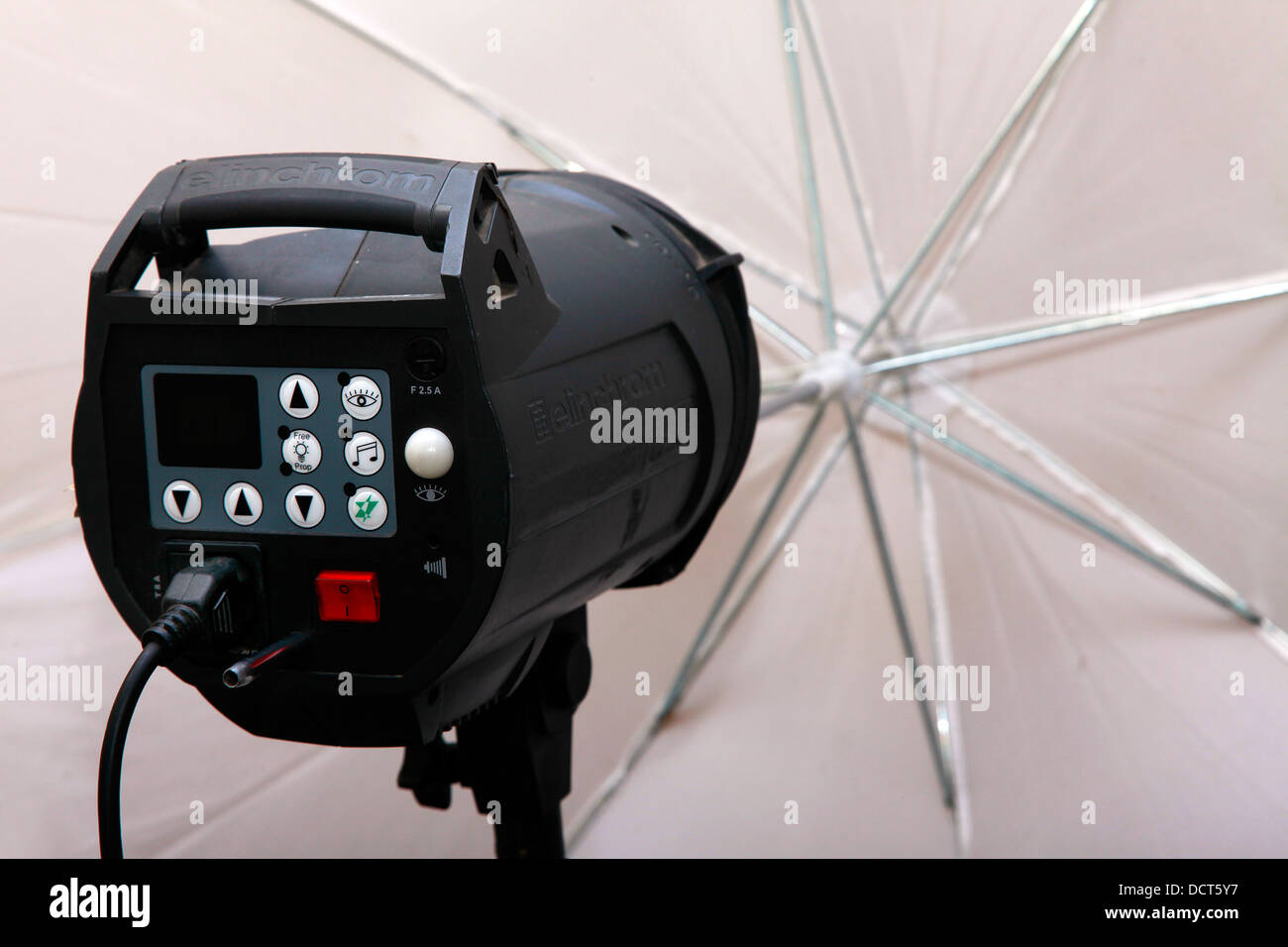 Photography Studio Flash Head with Umbrella Stock Photo Alamy