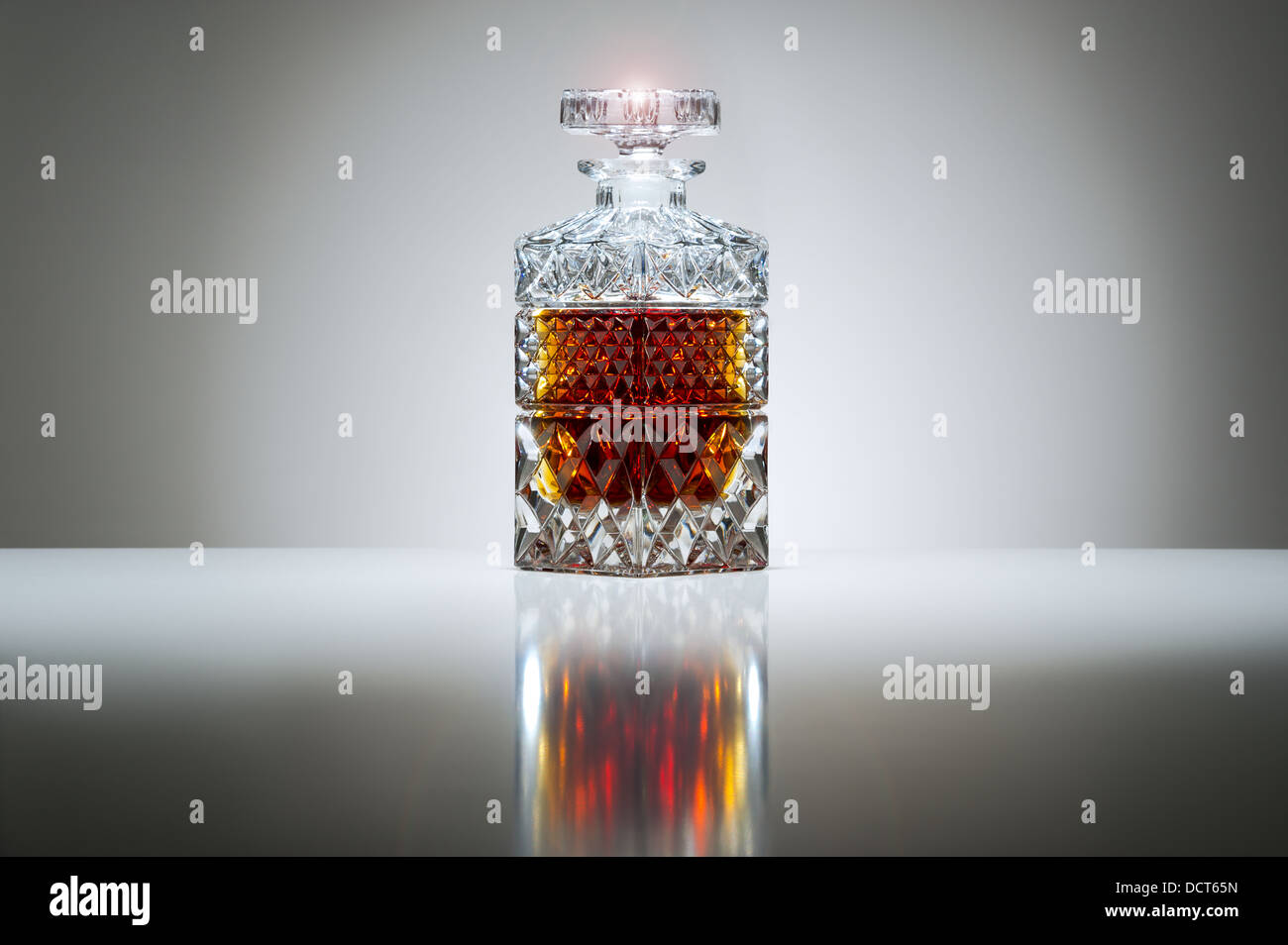 Crystal decanter with whiskey or brandy Stock Photo Alamy