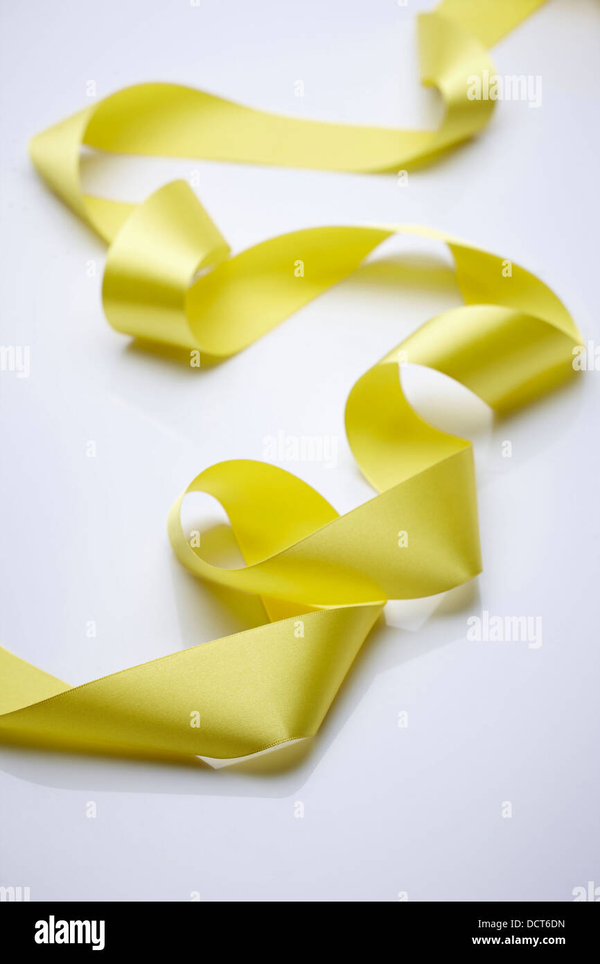 a yellow ribbon Stock Photo - Alamy