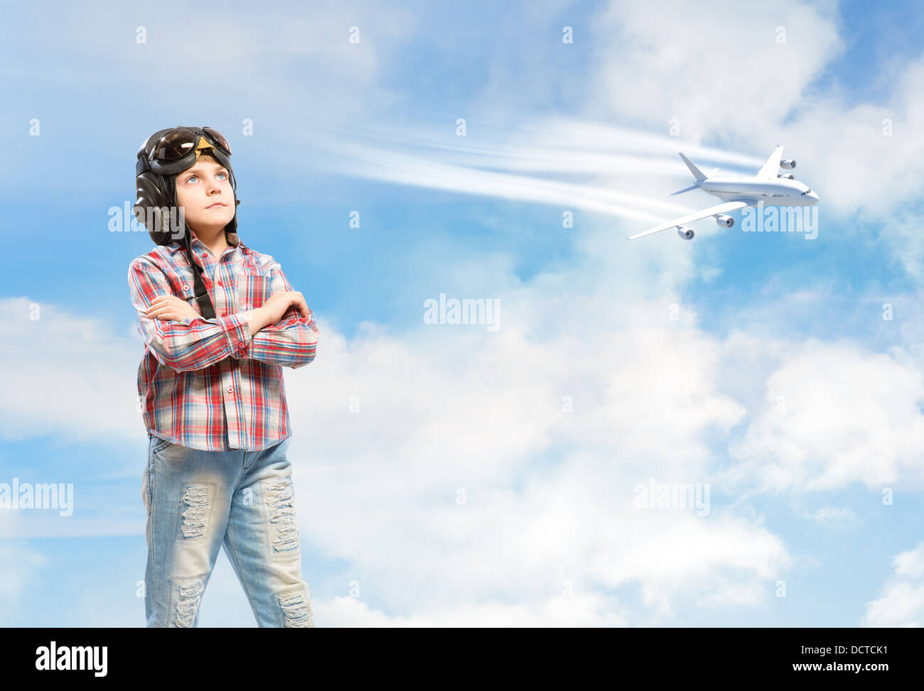 Boy in helmet pilot dreaming of becoming a pilot Stock Photo - Alamy