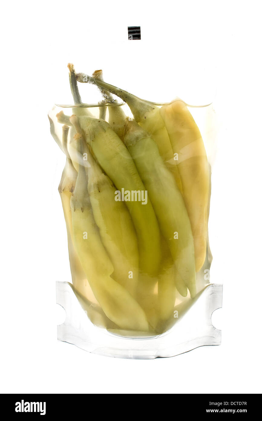 Hot chili peppers in plastic packaging on white Stock Photo Alamy