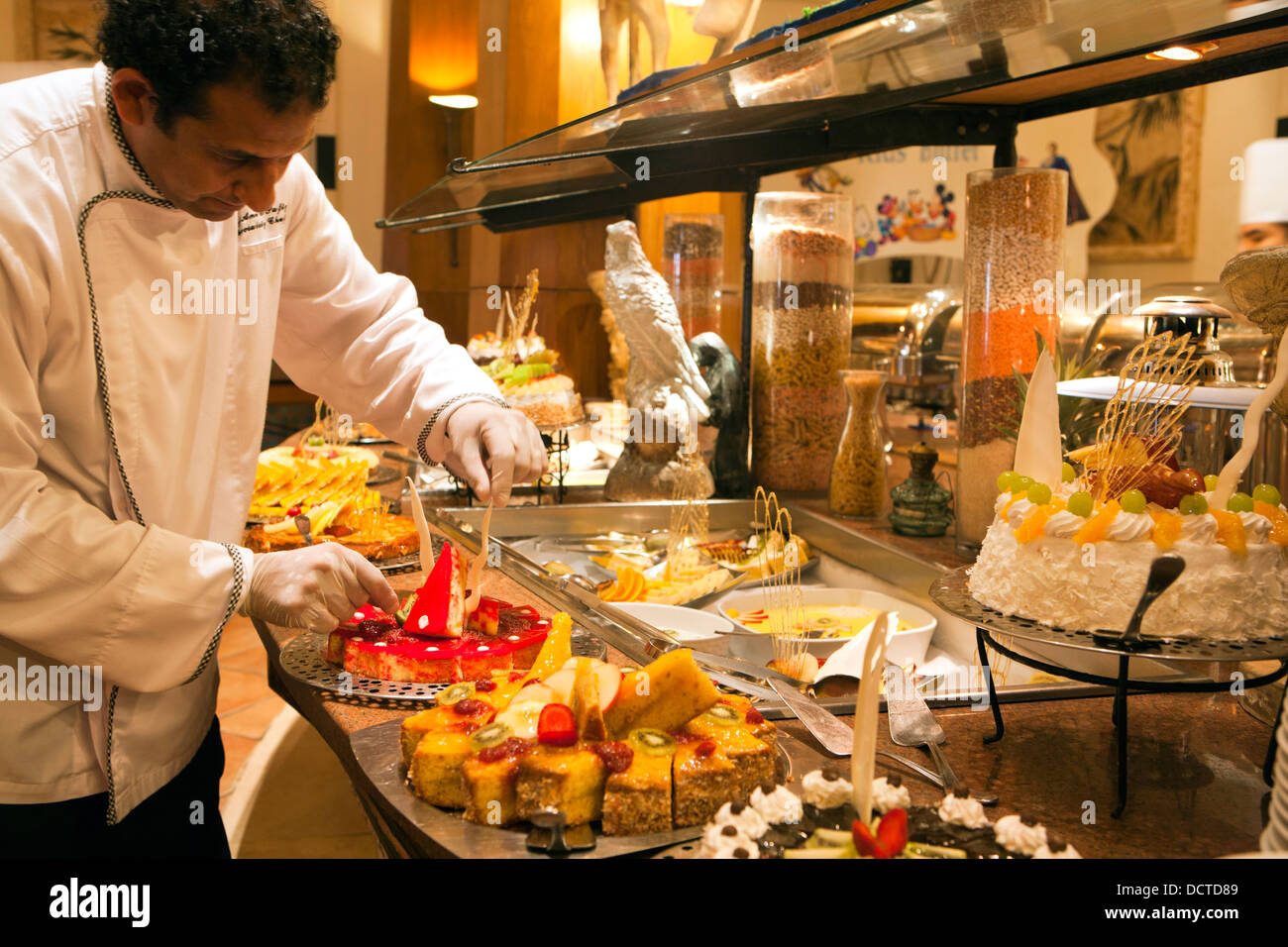Health and safety/ chef in Egypt wearing rubber gloves whilst attending