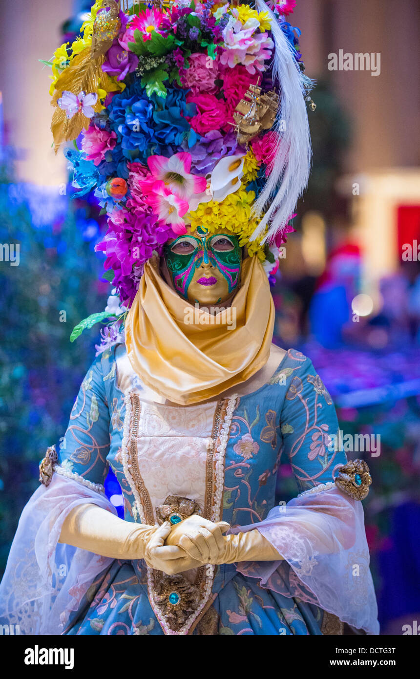 Performer dressed in costume at the Carnival experience festival in the
