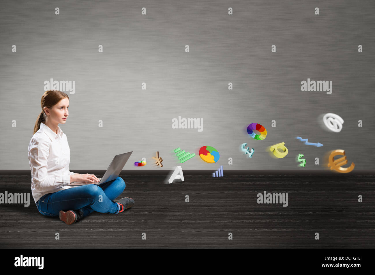 young girl sitting on the floor with a laptop Stock Photo - Alamy