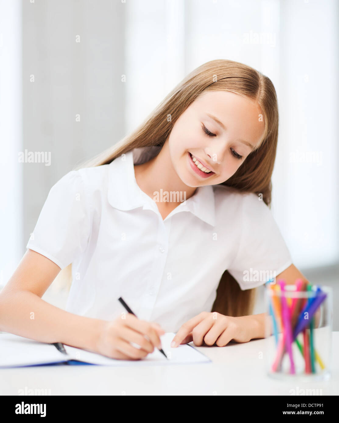 little student girl drawing at school Stock Photo - Alamy