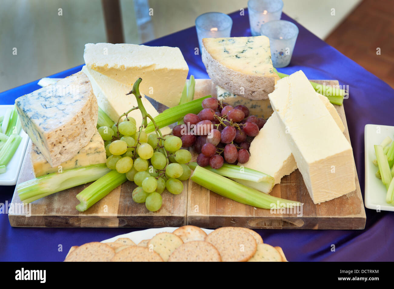 cheese selection with grapes and celery Stock Photo