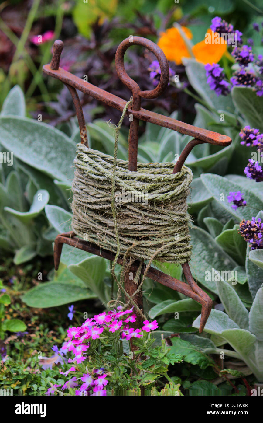 String wrapped around a metal stake for gardening Stock Photo Alamy
