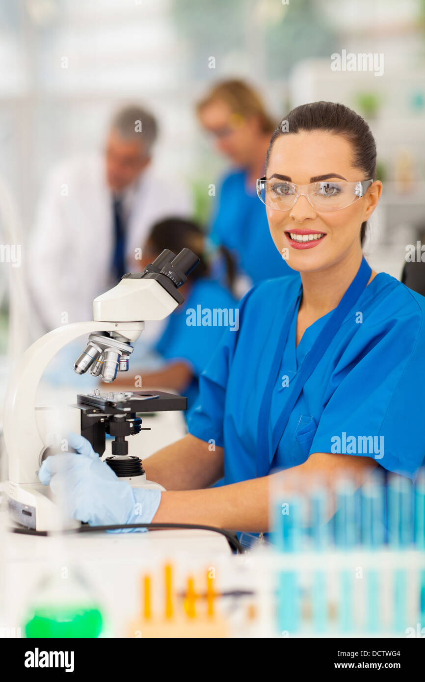 beautiful young female lab technician in laboratory Stock Photo