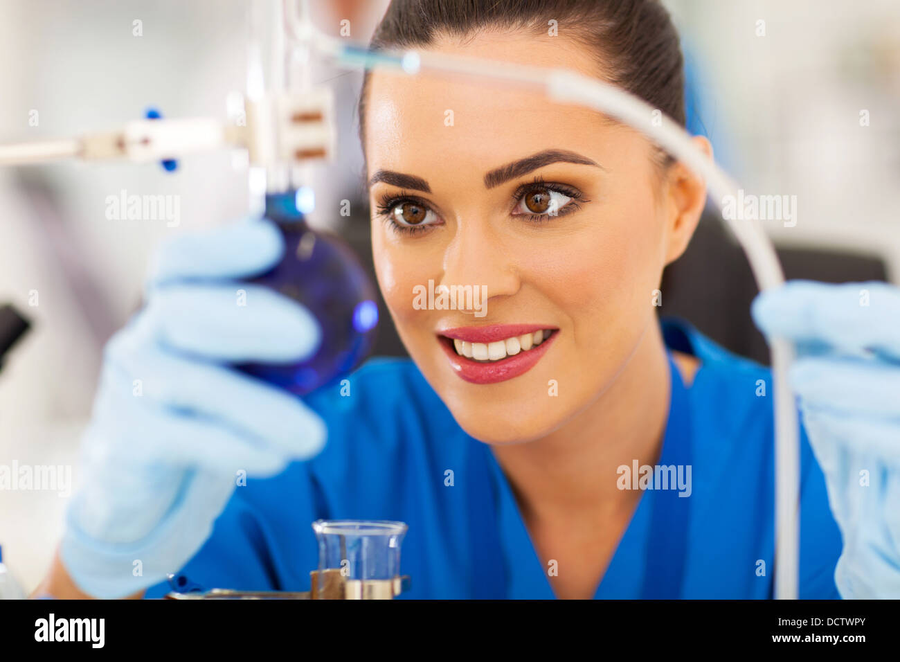 portrait of beautiful young scientist working in lab Stock Photo