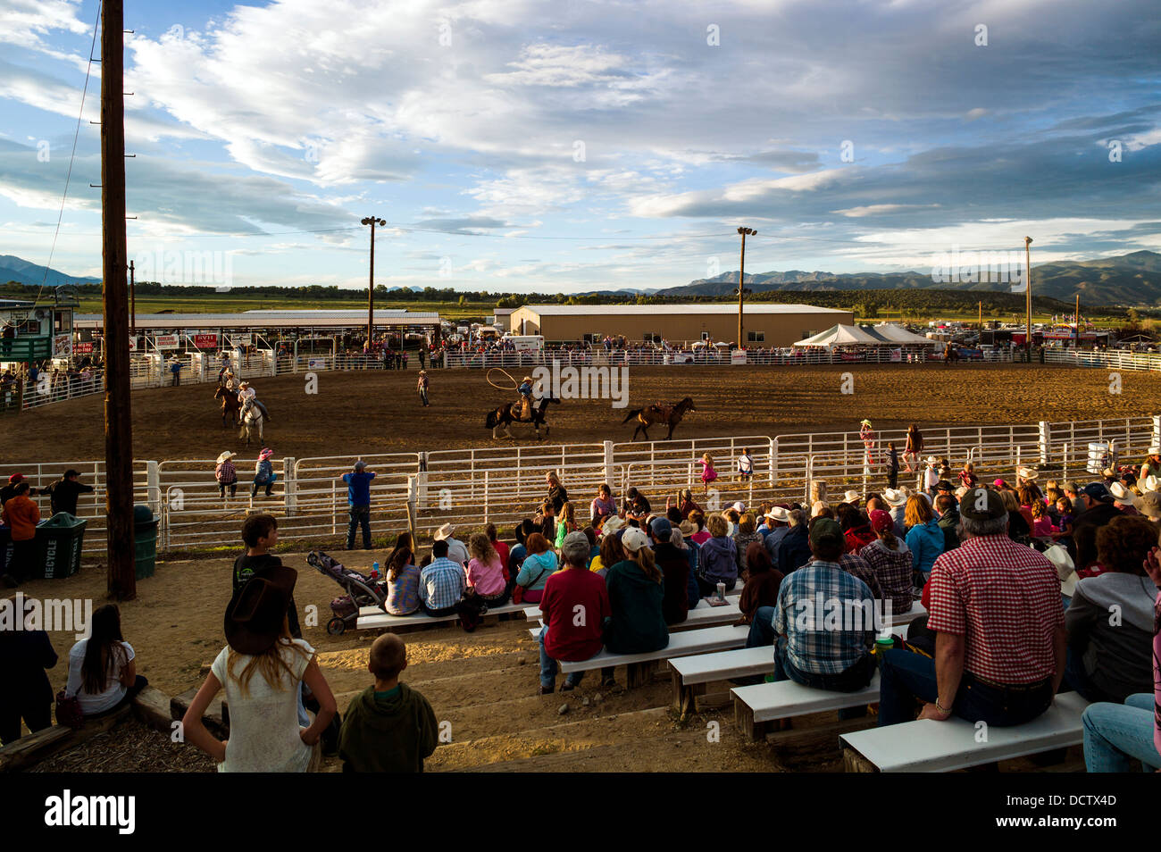 Spectators in bleachers watch the Chaffee County Fair & Rodeo Stock Photo