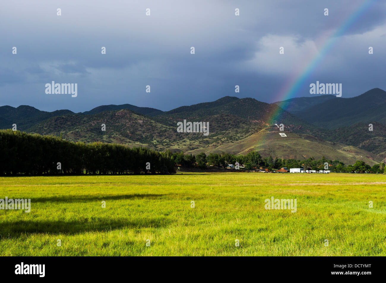 Rainbow over the small mountain town of Salida, Colorado, USA Stock Photo