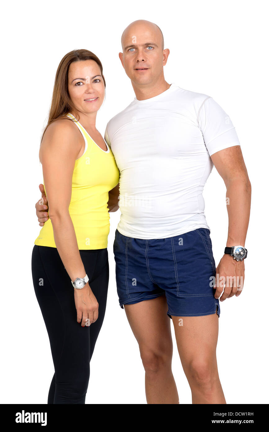 Fitness couple posing isolated in white Stock Photo