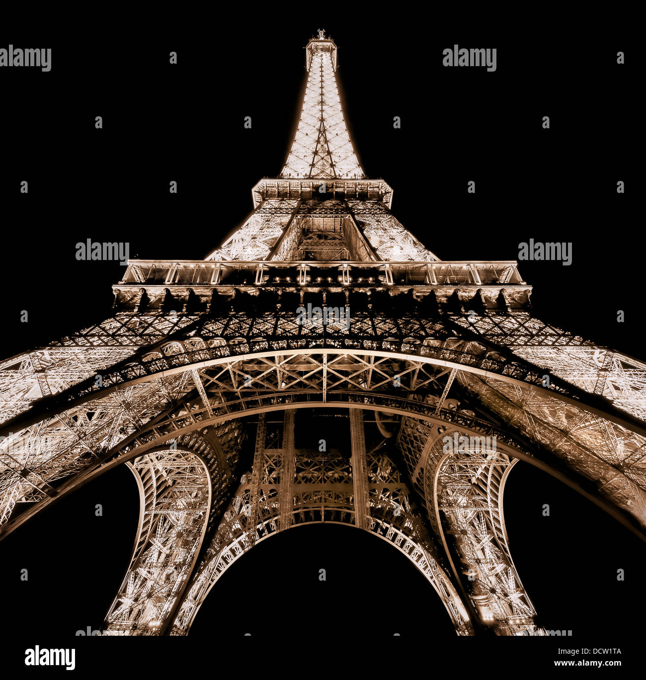 Eiffel tower at night in Paris, France. Stock Photo