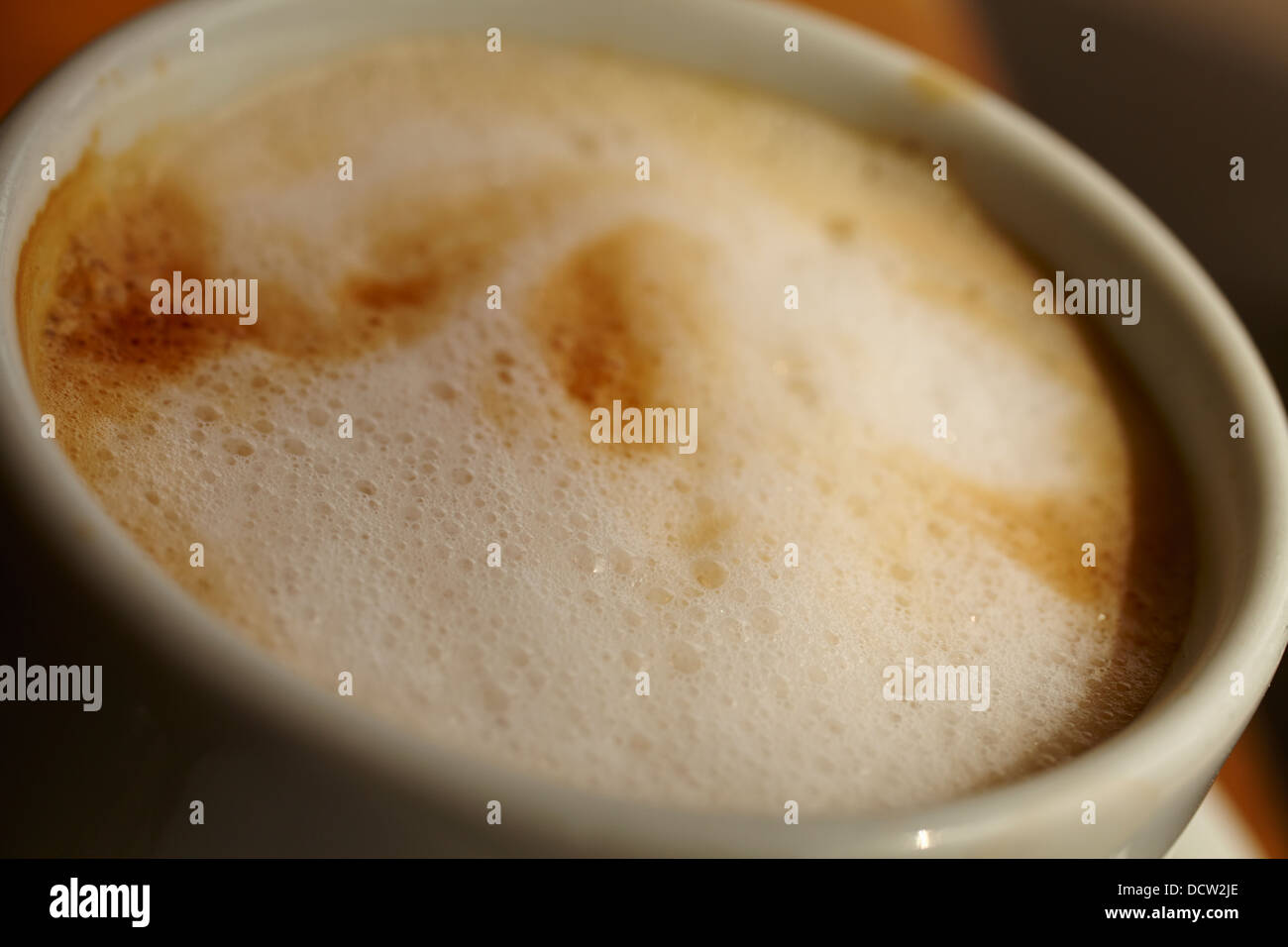espresso coffee with steamed milk in a cup Stock Photo Alamy