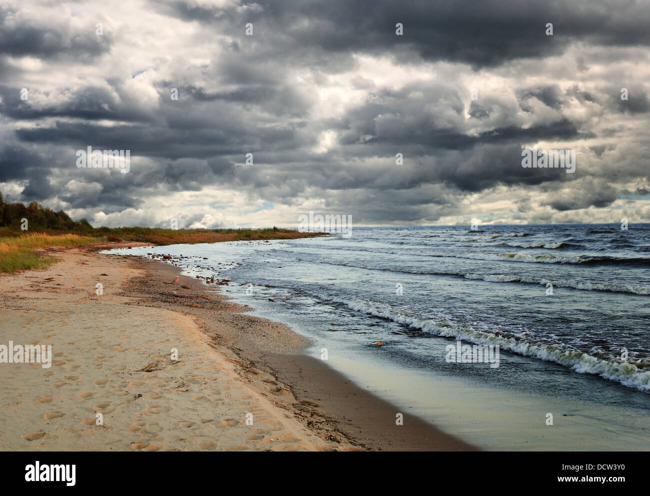 rainy clouds over the lake Stock Photo - Alamy