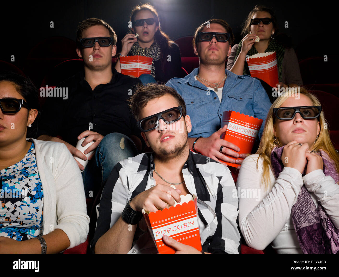 Scared movie spectators Stock Photo - Alamy