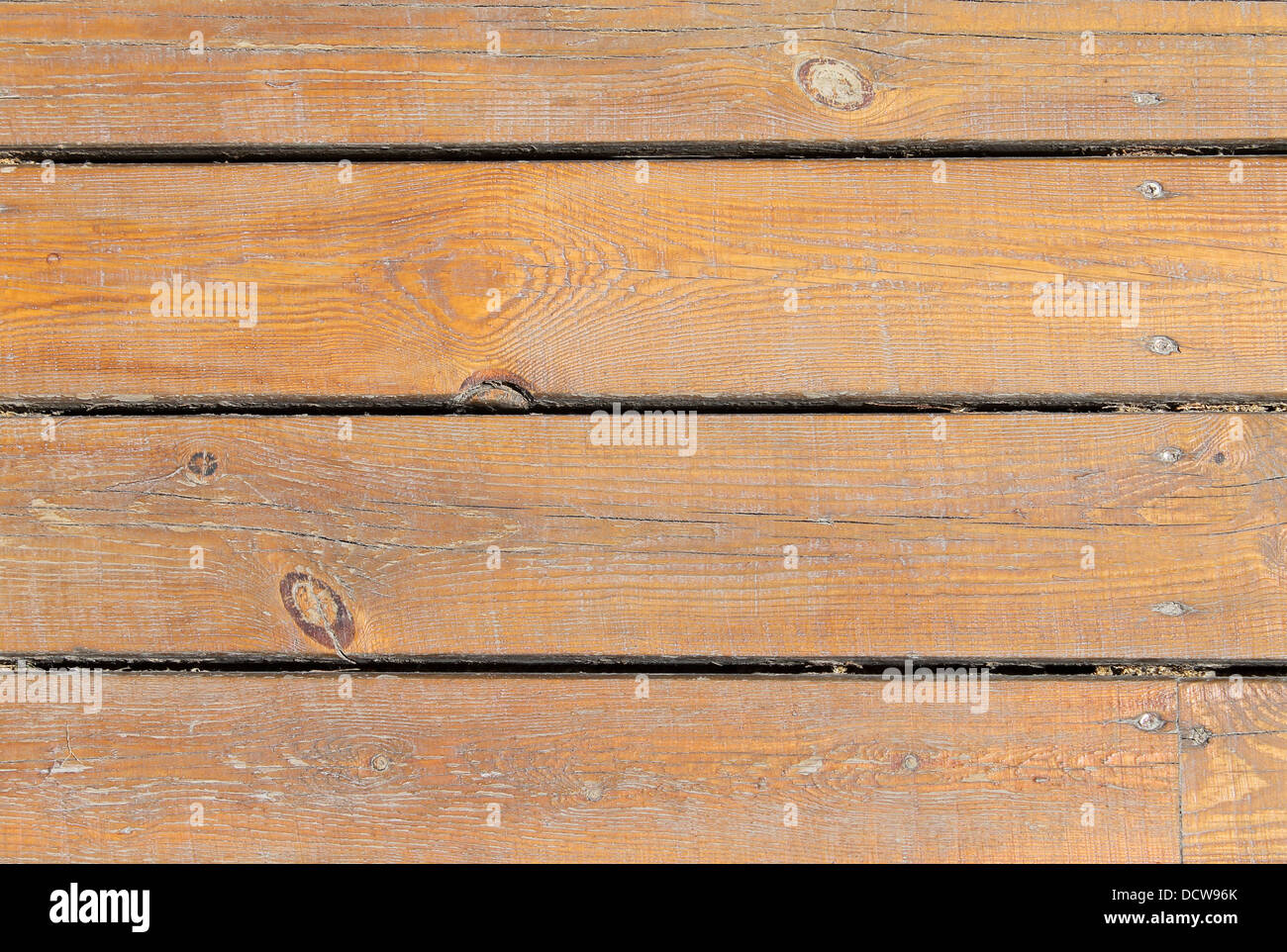 Overhead view of textured brown wooden background. Stock Photo