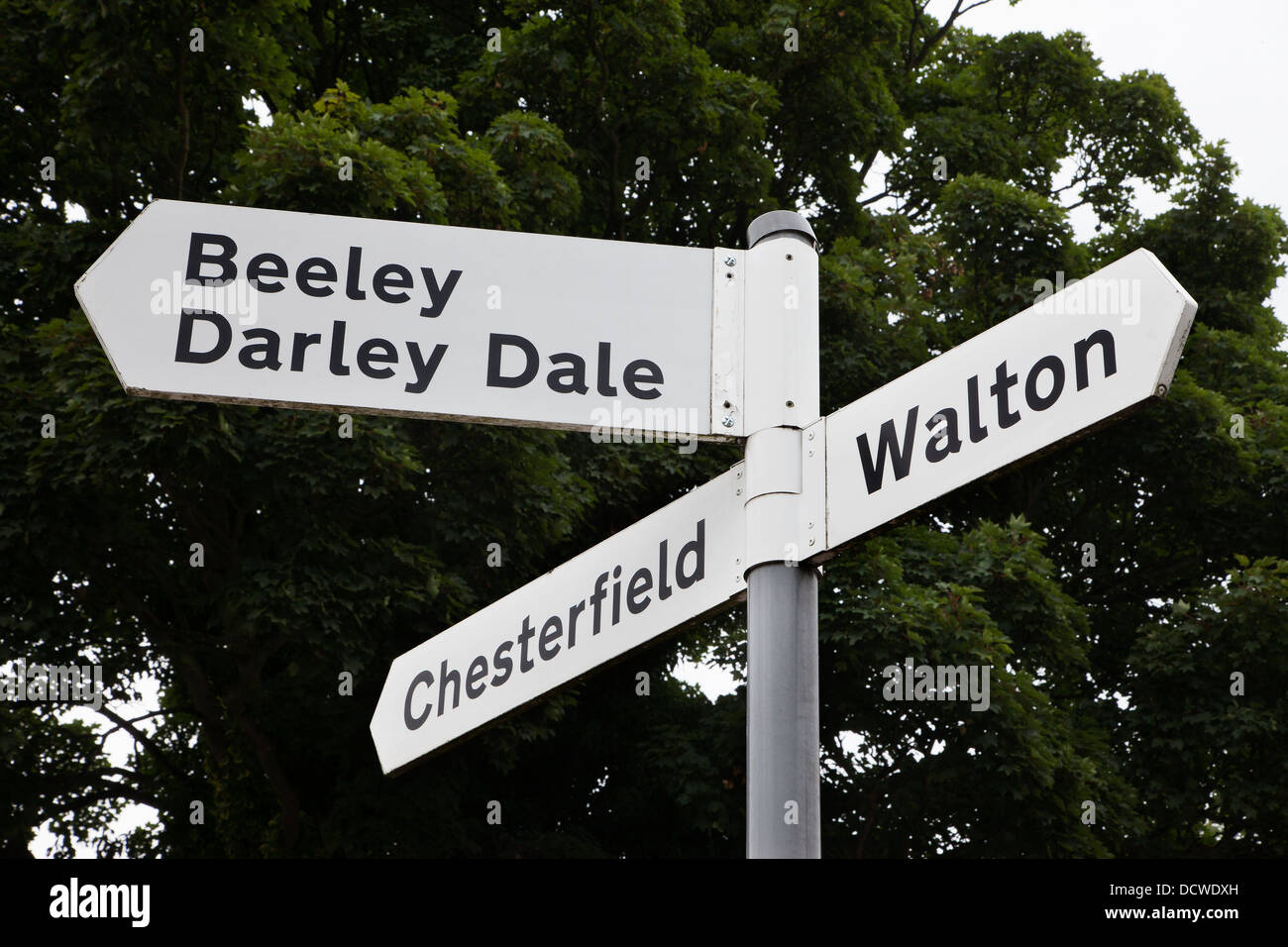 Three way road sign in Holymoorside, Derbyshire Stock Photo