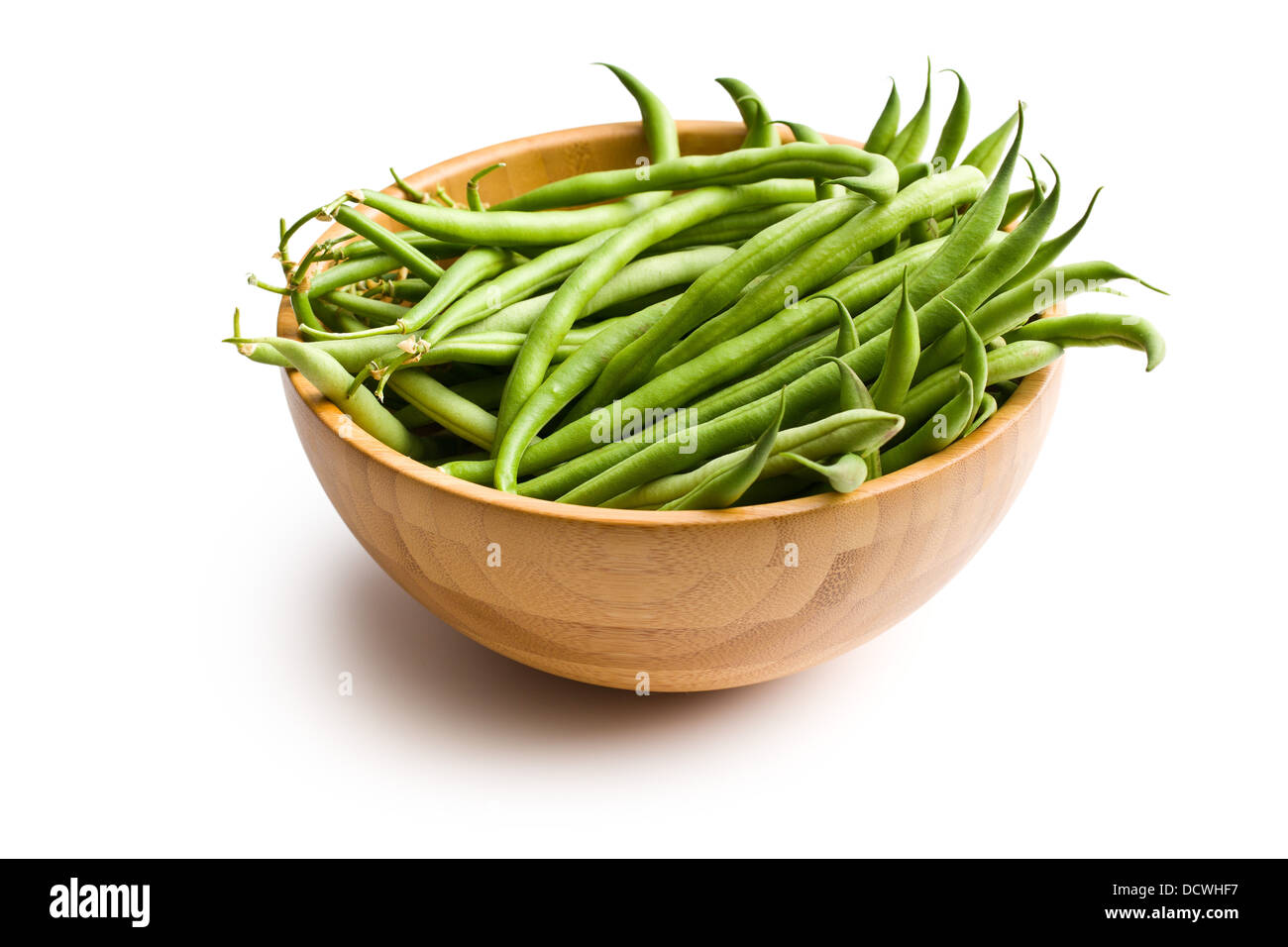 the fresh green beans in wooden bowl Stock Photo