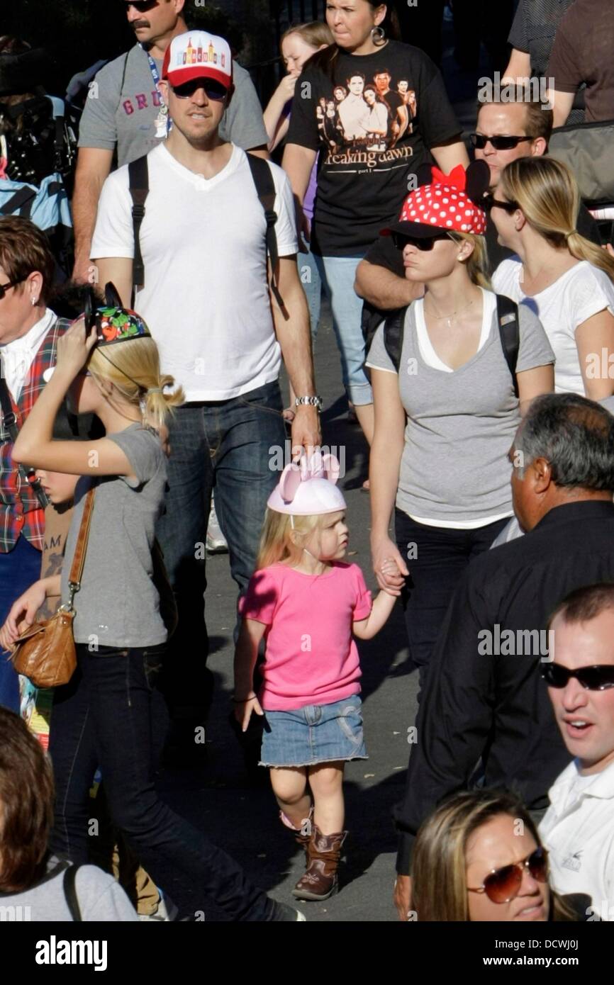 Reese Witherspoon and husband Jim Toth spend the day at Disneyland with