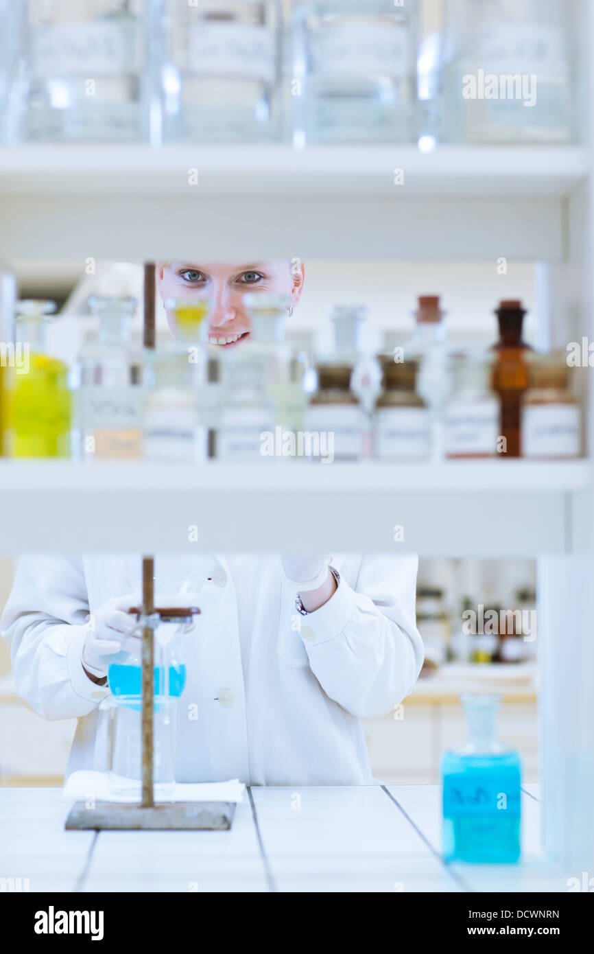 female researcher carrying out research in a chemical lab Stock Photo