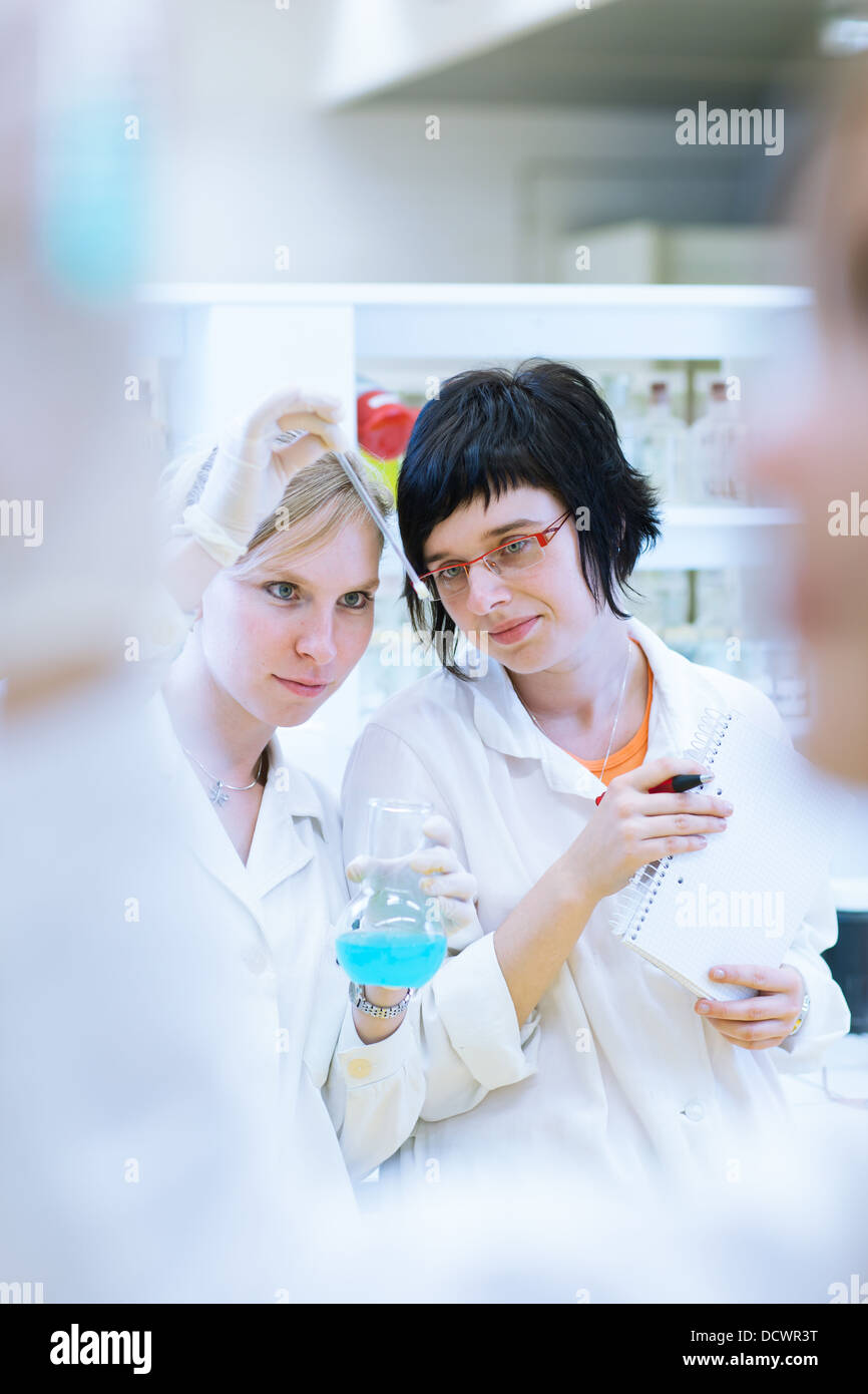 female researcher carrying out research in a chemistry lab Stock Photo ...