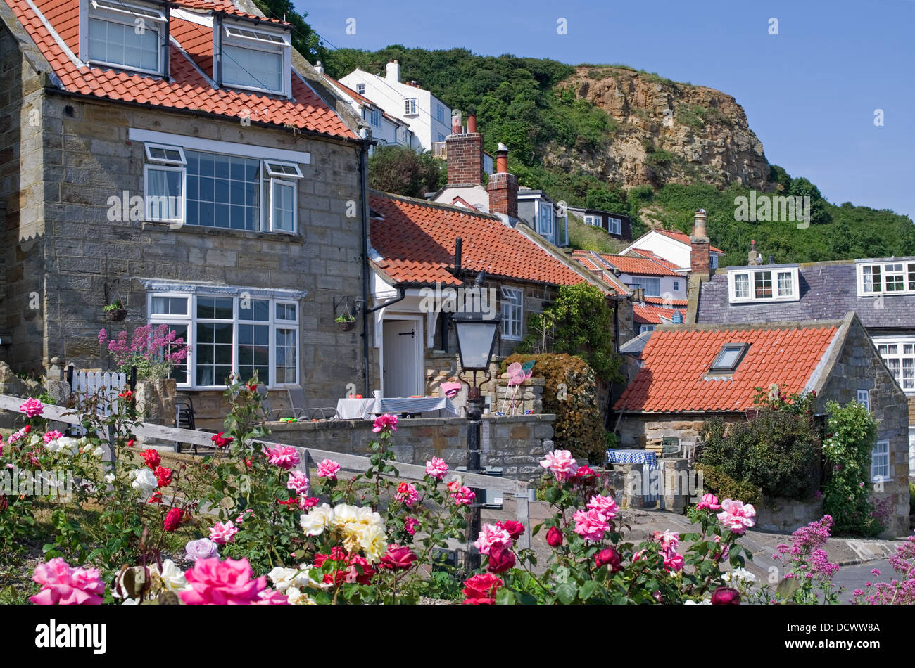Traditional Stone Holiday Cottages With Red Tiled Roofs At