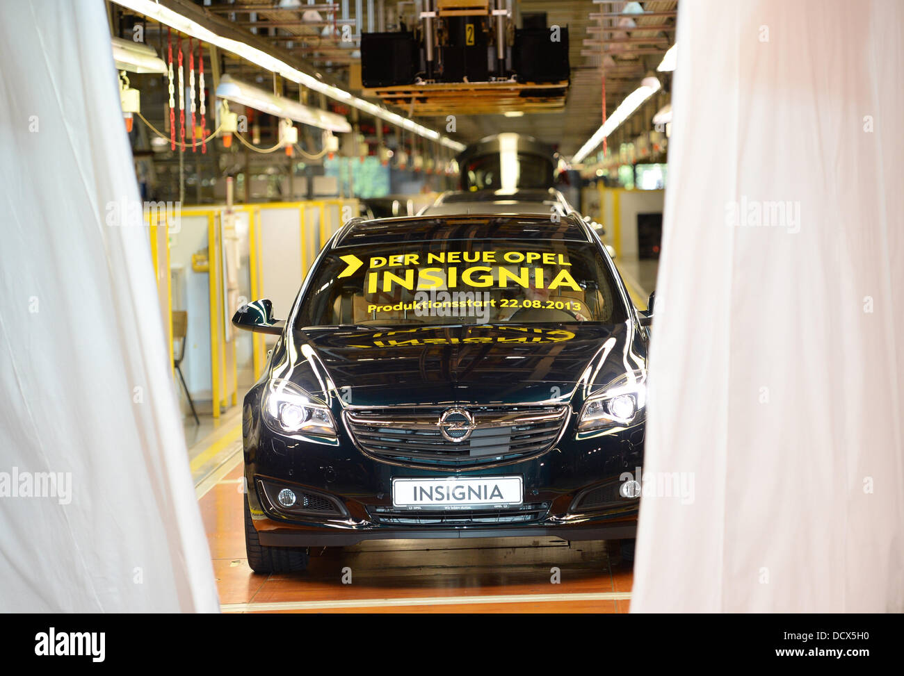 View of the first Opel Insignia Sports Tourer to be sold, at the Opel plant in Ruesselsheim, Germany, 22 August 2013. The car manufacturer has revised its nearly five-year-old flagship. The second Insignia generation - with a new design, new engines and a revised suspension - will be presented to the public at the IAA motor show in September. Photo: ARNE DEDERT Stock Photo