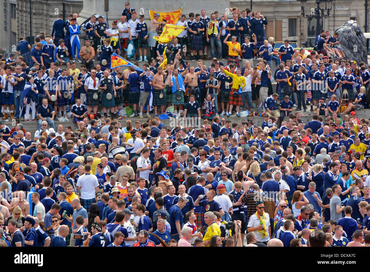 Crowds of Scotland football fans in Trafalgar Square prior to an international match at Wembley Stock Photo