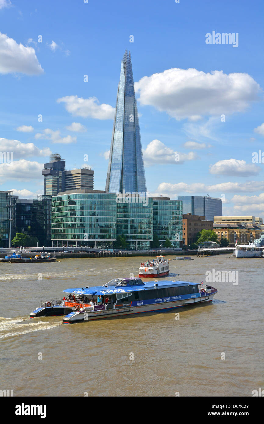 River Thames at the Pool of London with the Shard building dominating the skyline and which includes Shangri La luxury hotel occupying levels 34 - 52 Stock Photo
