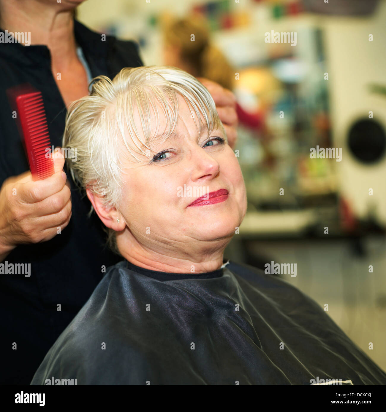 Mature woman hair dryer hi-res stock photography and images - Alamy