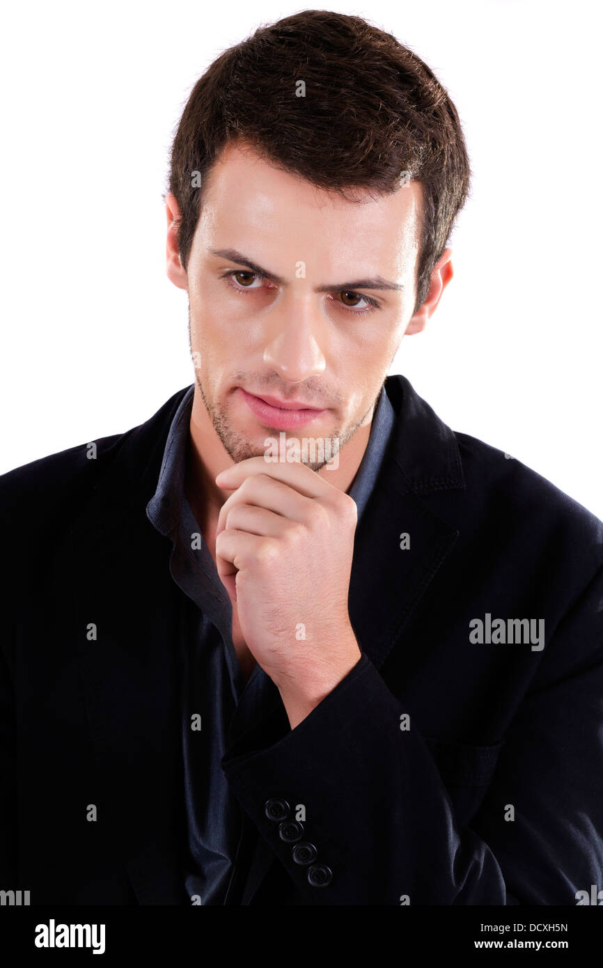 View of a young man standing against a white background Stock Photo - Alamy