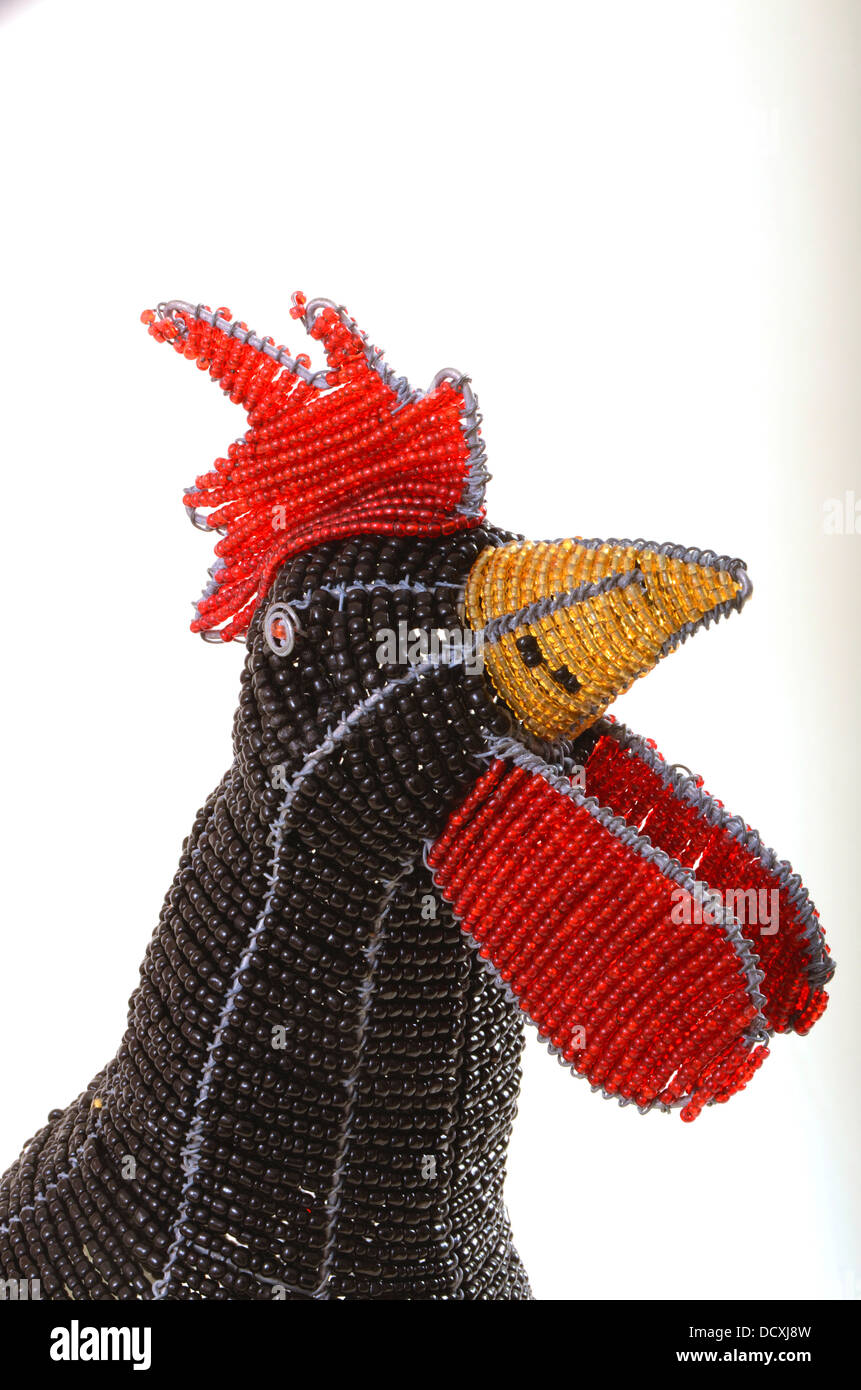 Model rooster handmade by threading beads onto a wire frame Stock Photo