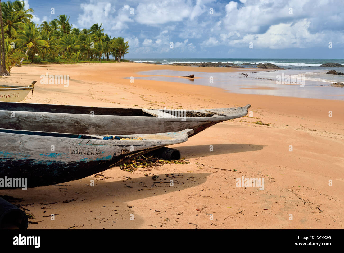 Brazil, Bahia: Dugout canoes at beach Praia Busca Vida in Camacari near Salvador Stock Photo