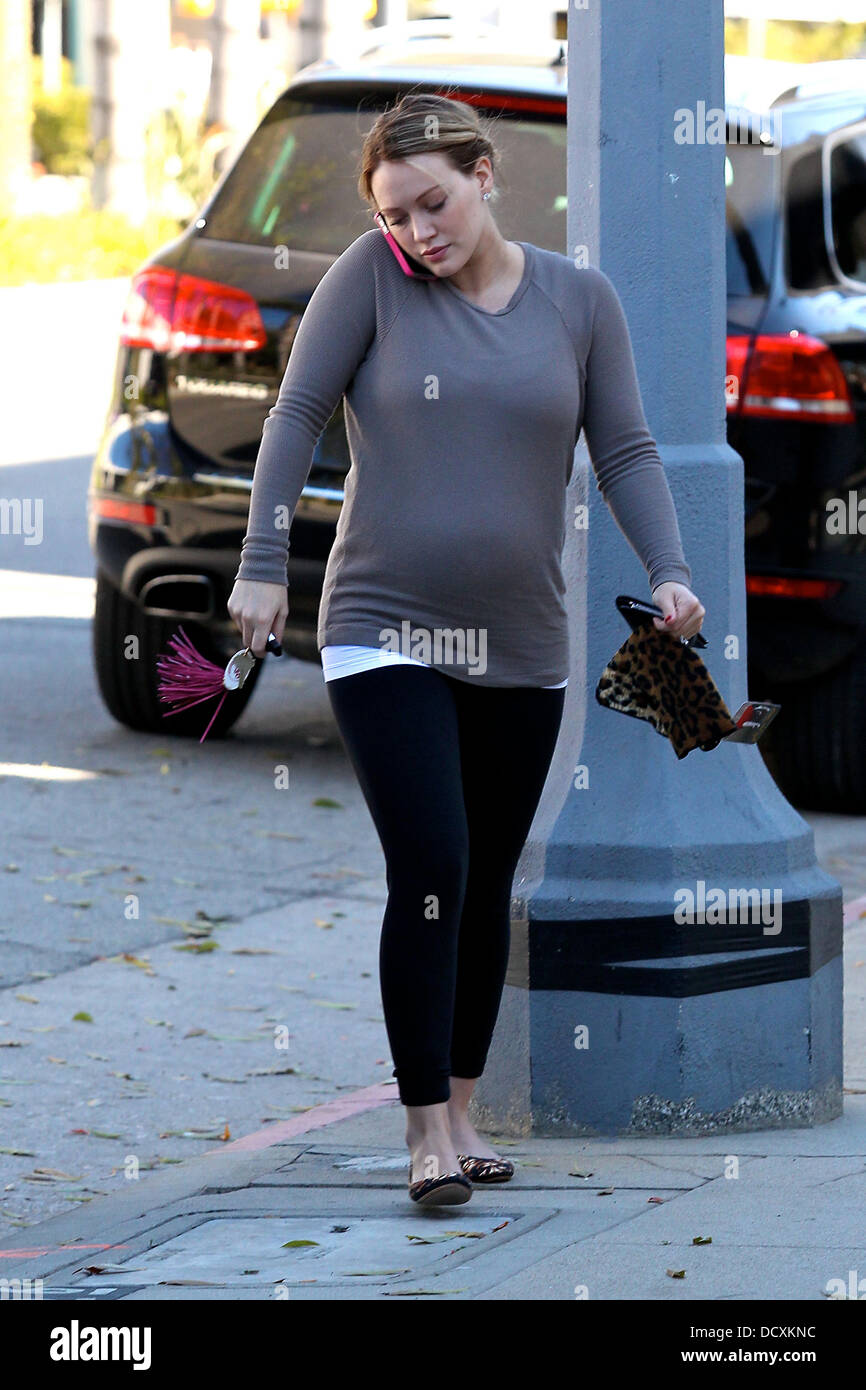 Pregnant Hilary Duff shows off her bump, while out Christmas shopping