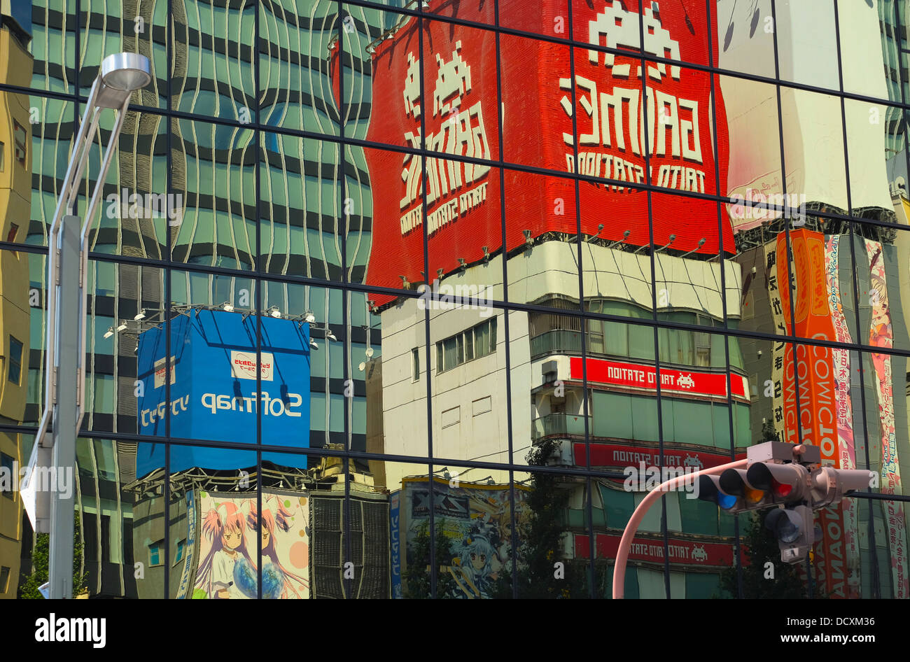 Taito game center sign reflection in Akihabara Stock Photo