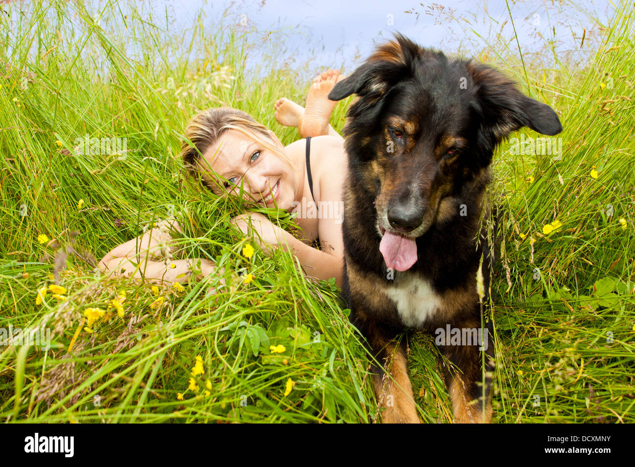 caucasian woman with her mongrel dog Stock Photo
