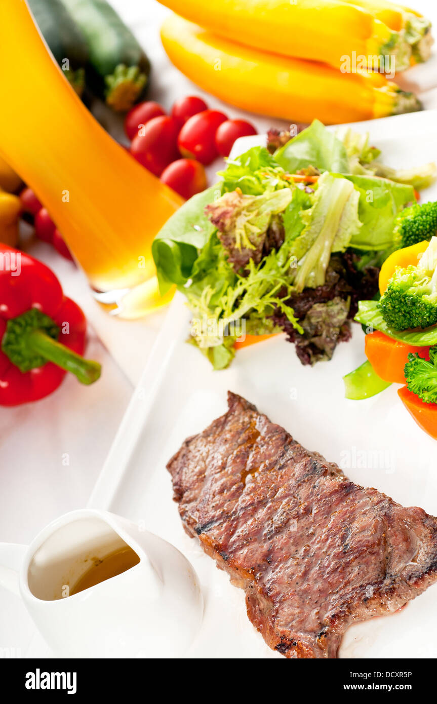 juicy BBQ grilled rib eye ,ribeye steak and vegetables Stock Photo Alamy