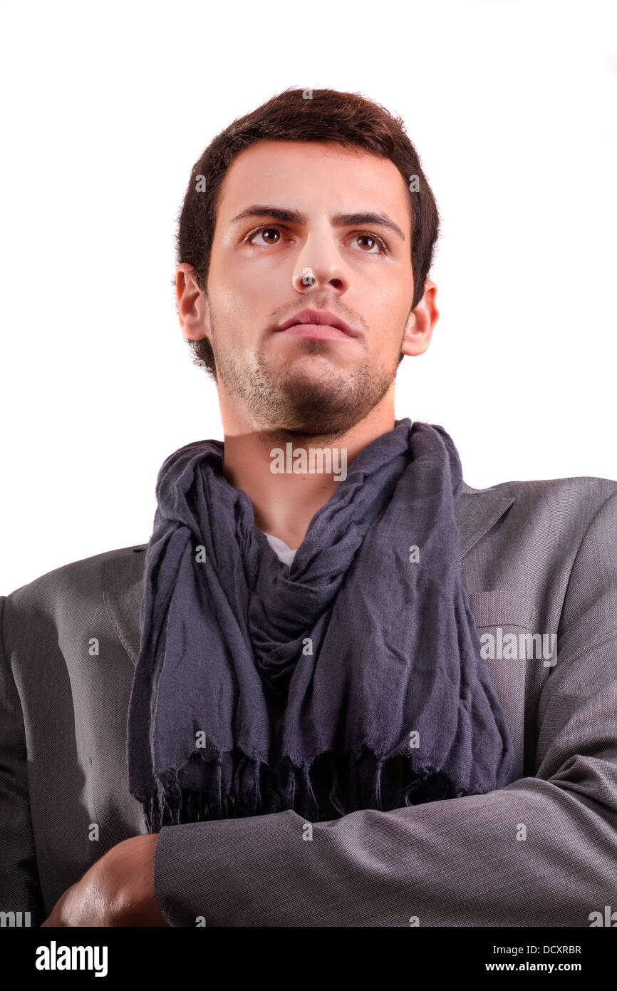View of a young man standing against a white background Stock Photo - Alamy