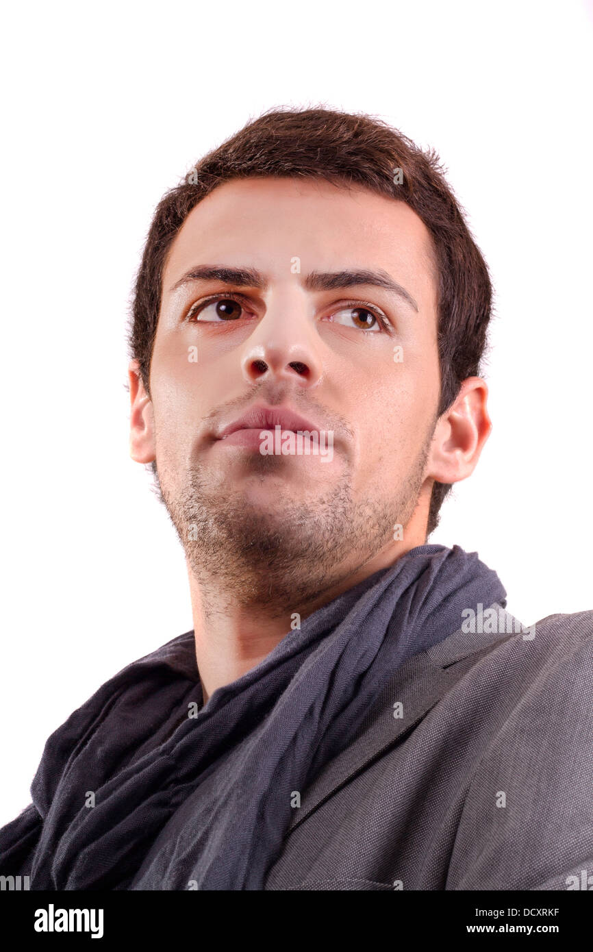 View of a young man standing against a white background Stock Photo - Alamy