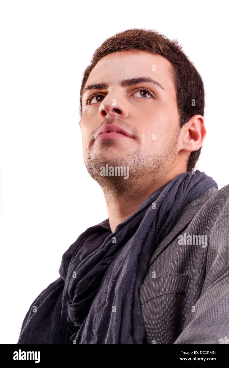 View of a young man standing against a white background Stock Photo - Alamy