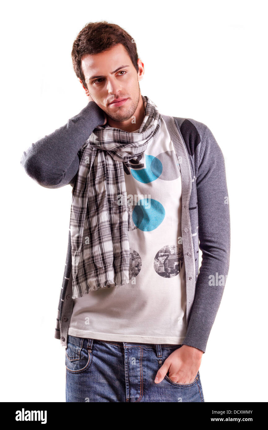 View of a young man standing against a white background Stock Photo - Alamy