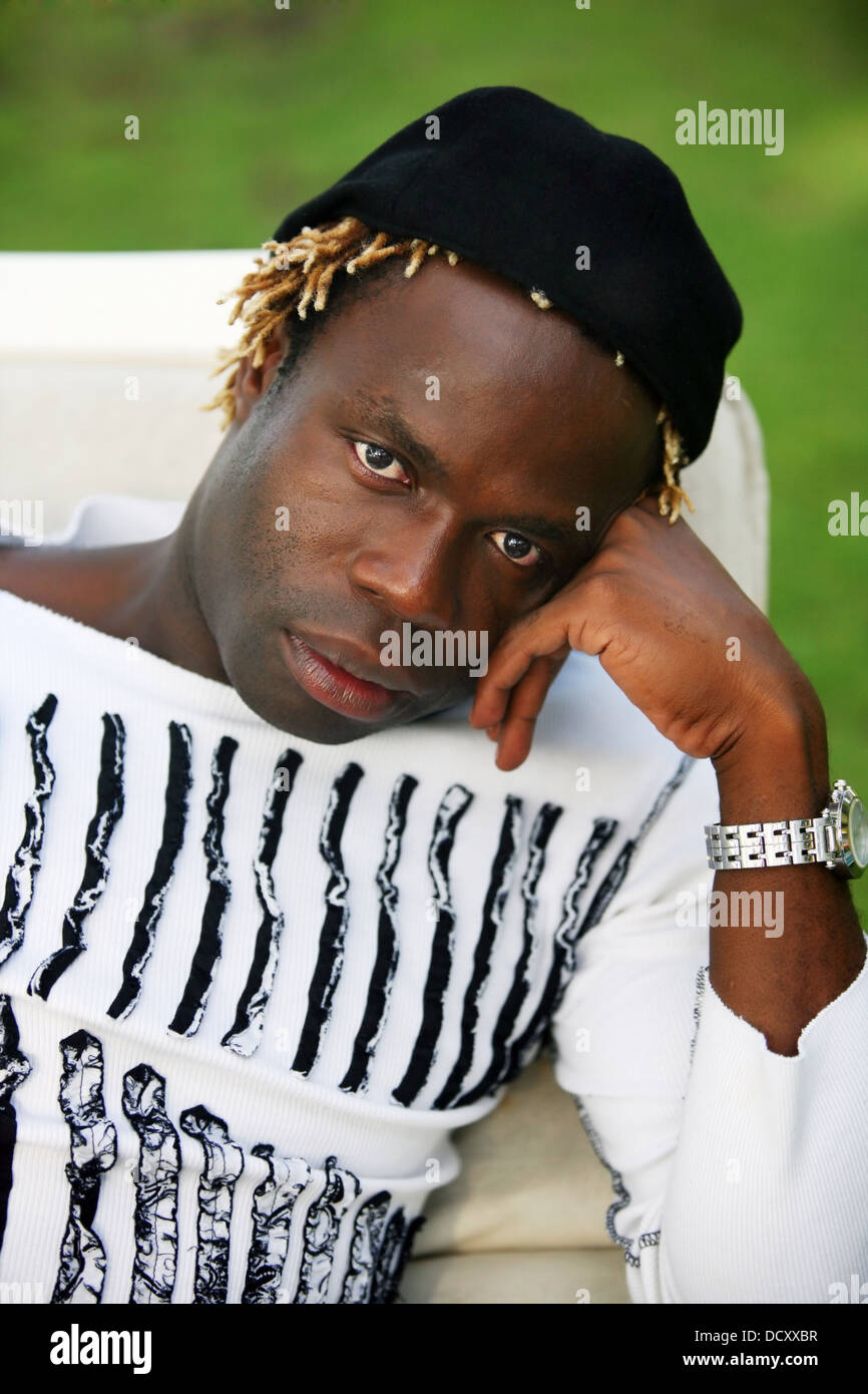 Portrait of young sad man Stock Photo - Alamy
