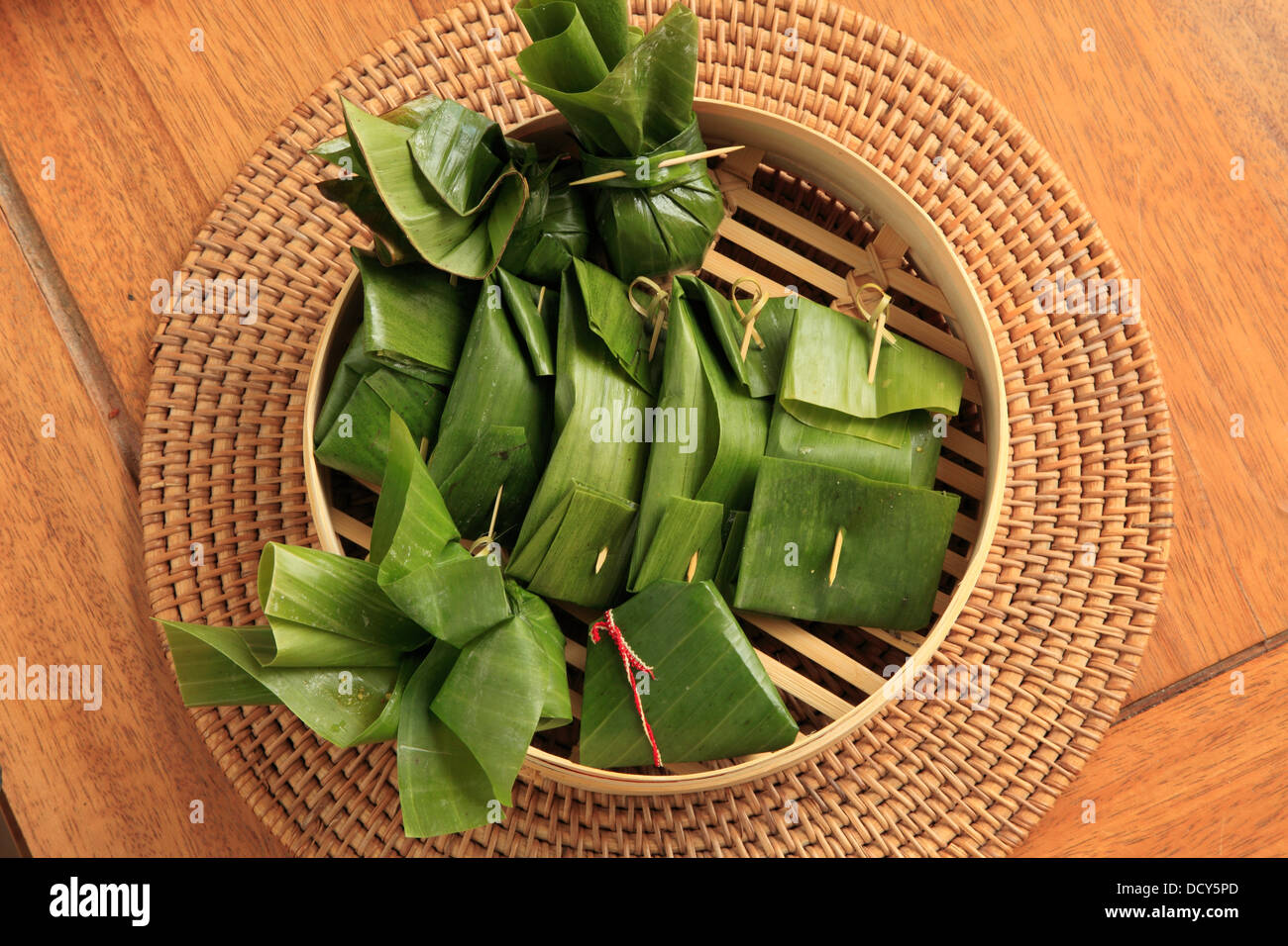 Burmese steamed fish in banana leaves Stock Photo Alamy
