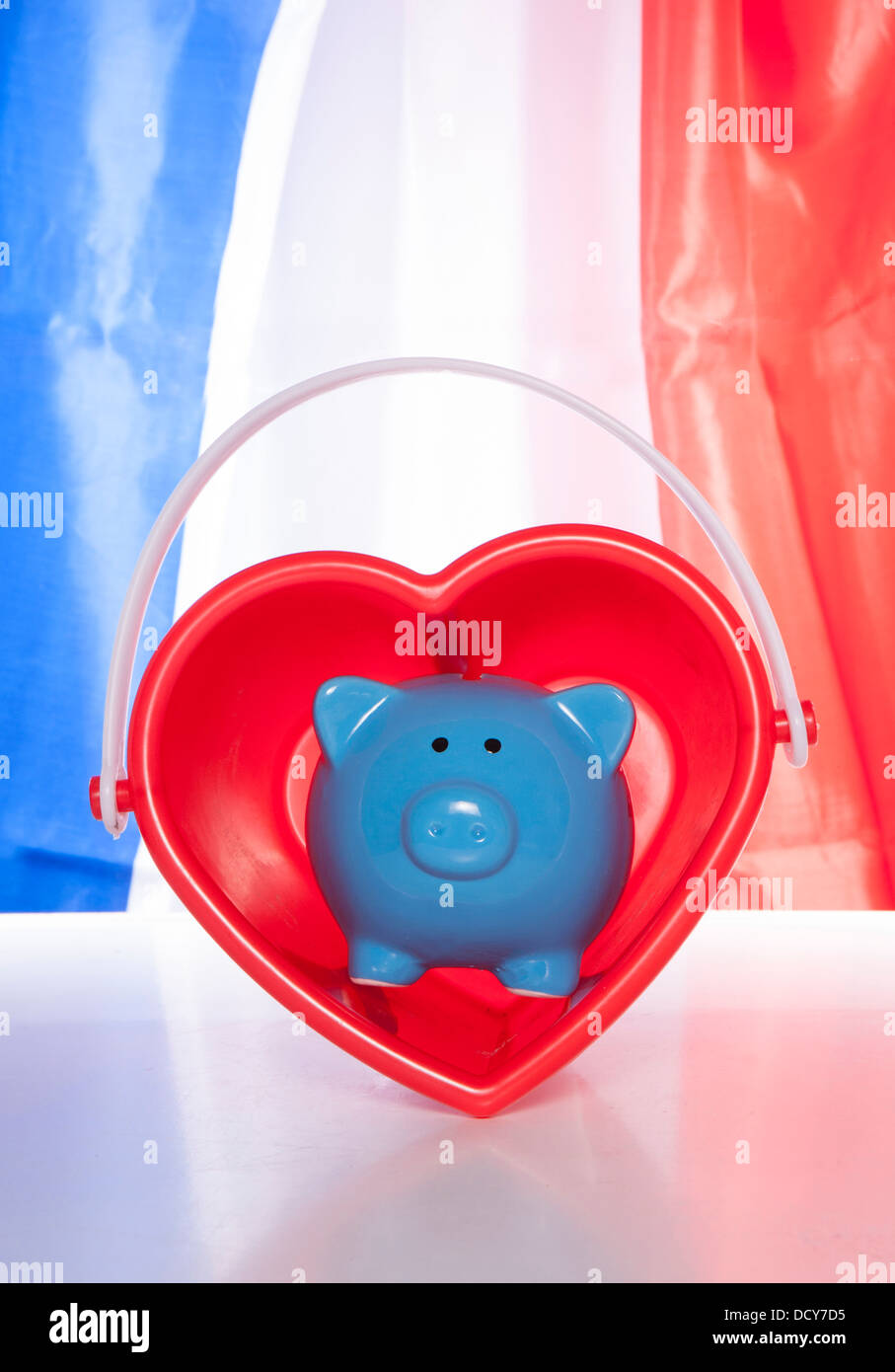 love saving piggy bank on a french flag Stock Photo