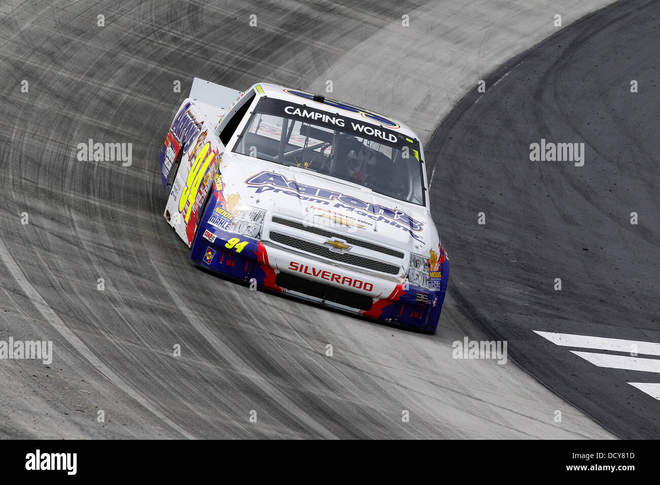 Bristol, TN, USA. 21st Aug, 2013. Bristol, TN - Aug 21, 2013: Chase Elliott (94) brings his Camping World Truck through the turns during a practice session for the UNOH 200 race at the Bristol Motor Speedway in Bristol, TN. Credit:  csm/Alamy Live News Stock Photo