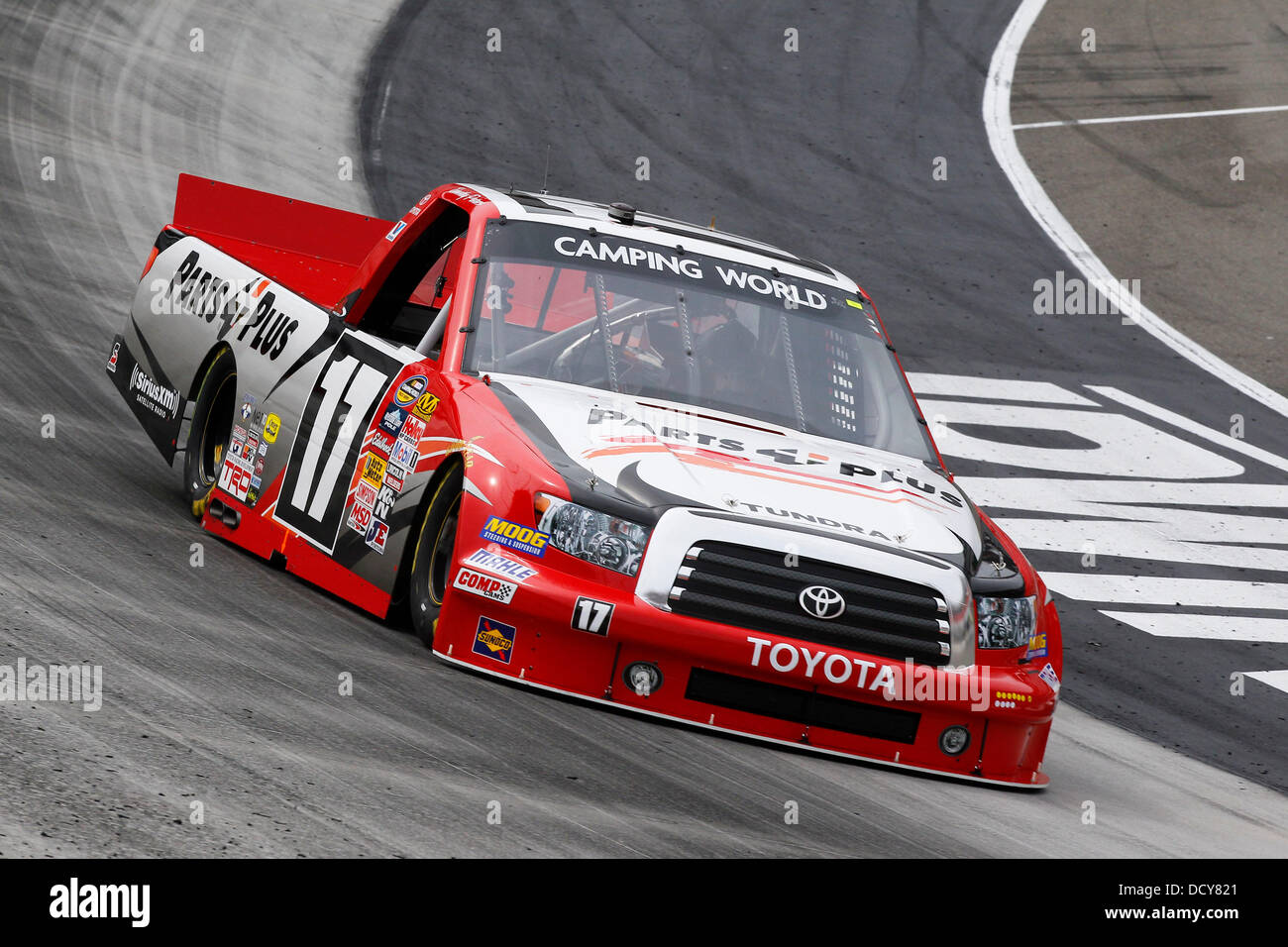 Bristol, TN, USA. 21st Aug, 2013. Bristol, TN - Aug 21, 2013: Timothy Peters (17) brings his Camping World Truck through the turns during a practice session for the UNOH 200 race at the Bristol Motor Speedway in Bristol, TN. Credit:  csm/Alamy Live News Stock Photo
