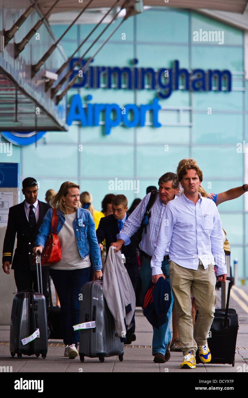 Passengers exiting arrivals Terminal at Birmingham airport Stock Photo